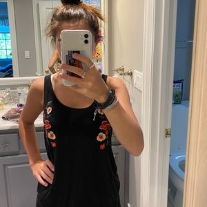 black tank with floral design